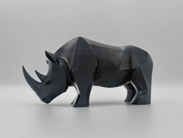 Geo Rhino Sculpture – Modern Animal Art Piece